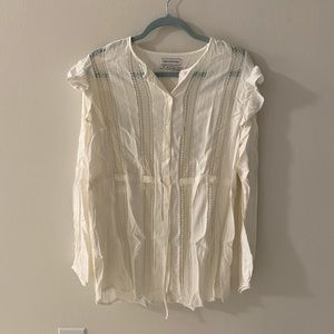 Urban Outfitters cream colored semi sheer blouse. Cinch waist. Size M. NWT.